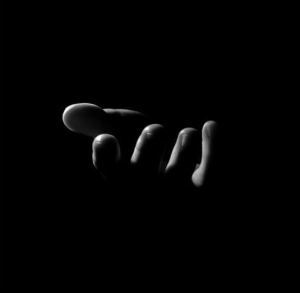 Hand in darkness